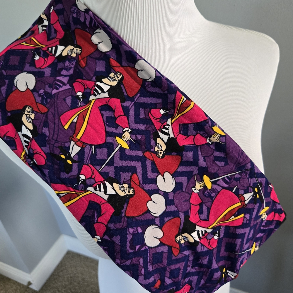 NWOT LuLaRoe Disney Purple and Pink Patterned Leggings